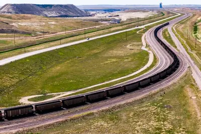 Rail cars loaded with coal from the Black Thunder Mine near Wright, Wyoming. Economists and business executives say abrupt changes in regulations make it difficult for industries to plan. 